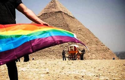 The LGBTQ+ pride flag in front of the Pyramids of Giza in Egypt. Sarah Hegazy was arrested for raising the flag in October of 2017. 